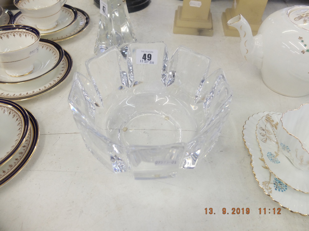 An Orefors glass bowl with block cut design signed