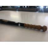 A late 19th early 20th century turned wood truncheon,