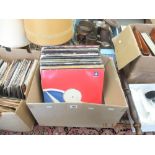 A box of vinyl records, house,