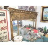 A Victorian gilt wood and gesso over mantle mirror