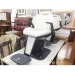 Two hydraulic barbers chairs