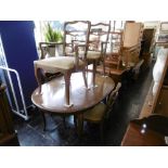 An extending dining table and six chairs