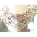 A mahogany extending dining,