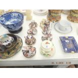 A Noritake Imari pattern coffee set and another part set