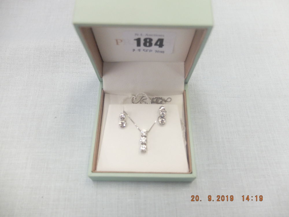 A pair of 18ct white gold and diamond earrings plus a matching pendant on white gold chain (9ct - Image 2 of 2