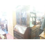 A mahogany bureau bookcase