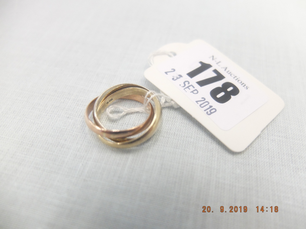 A 9ct three colour gold Russian style wedding ring weight 5 grams,