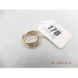 A 9ct three colour gold Russian style wedding ring weight 5 grams,