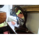 A mahogany swing toilet mirror