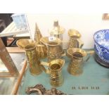 A quantity of brass including jugs and a musical lantern