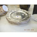 A set of eight 19th century silver plated dinner plates