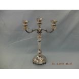 A white metal candelabra marked 925