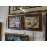 A pair of framed silk pictures