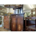 A 19th century rosewood corner cabinet