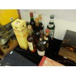 Nine bottles of alcohol including Harrods Whisky