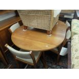 A retro Dyrland table with two leaves and six chairs