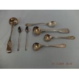 An assortment of silver condiment spoons