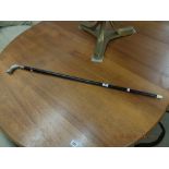 A silver plate toped walking stick