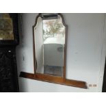 A walnut over mantle mirror and another