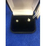 A pair of 18ct gold champagne diamond stud earrings 0.