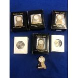 Seven miniature clocks,