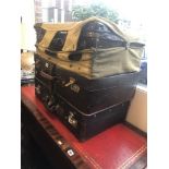 Three vintage suitcases