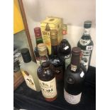 Nine bottles of alcohol including Harrods Whisky