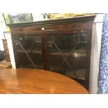 A mahogany glazed bookcase