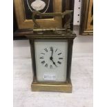 A brass carriage clock