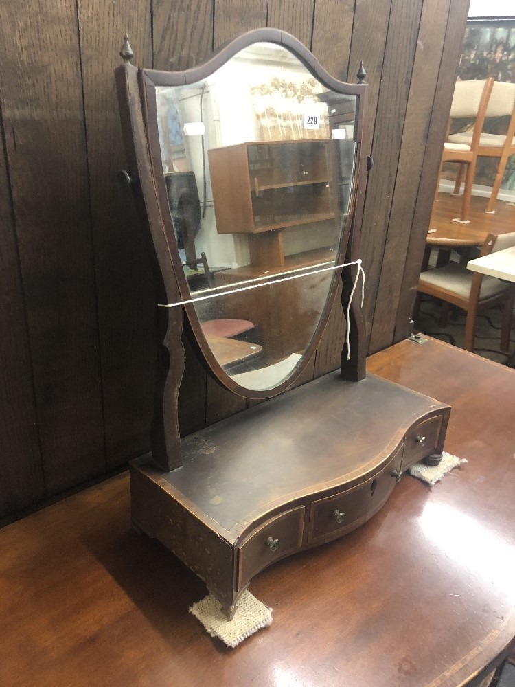 An inlaid toilet swing mirror