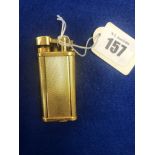 A gold plated Dunhill unique lighter