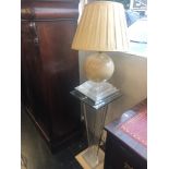 A decorative designer lamp stand