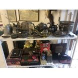 An assortment of metalware including vintage tins etc