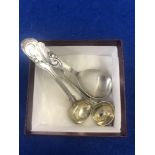 A pair of hm silver Georgian mustard spoons and a Danish silver caddy spoon