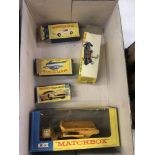 A boxed Dinky Pathe News Fiat (figure and box A/F) and four boxed Matchbox vehicles with some play