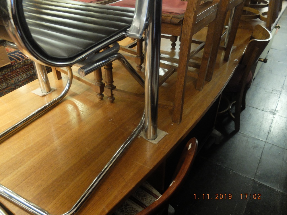A teak boardroom table