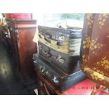 Three vintage suitcases