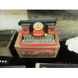 A Mettoy limited Mettype toy typewriter in very good condition with original box late 1940s