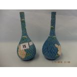 A circa 1900 pair of Japanese hand painted vases,