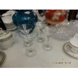 A set of four champagne coupes