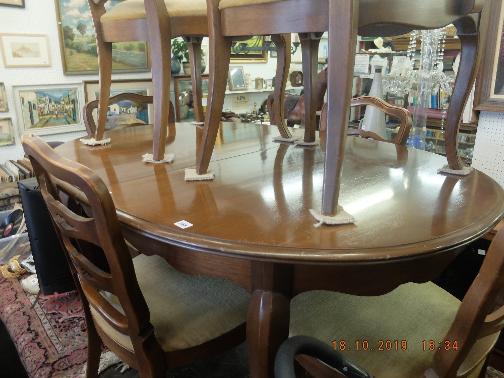 An extending dining table and six chairs