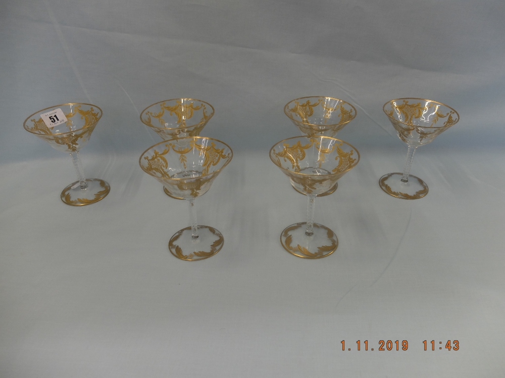 A fine quality set of six cut crystal and gilt overlay thistle champagne coupes, glasses unmarked,