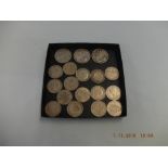 A collection of assorted coins including three silver jubilee crowns, 1895, 1900 etc,