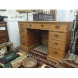 A 19th century pine pedestal desk