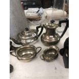 A four piece silver plated tea set