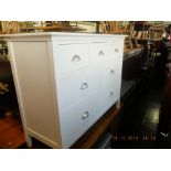 A modern John Lewis white painted chest of six drawers