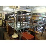 A wrought iron and glass table and three chairs 1 A/F
