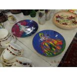 A pair of Royal Doulton Leroy Neiman plates