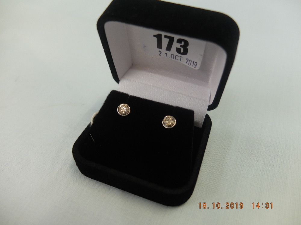 A pair of 18ct gold champagne diamond stud earrings, approximately 1. - Image 2 of 2
