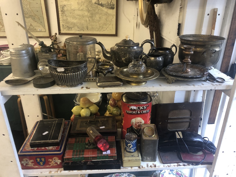 An assortment of metalware including vintage tins etc